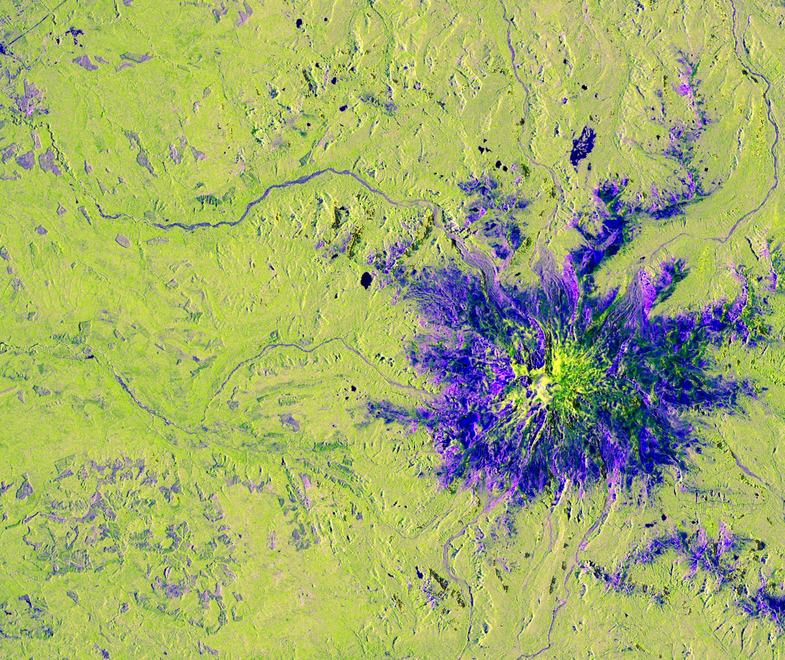 NISAR satellite illustration showing Mount Rainier on Nov. 10, 2025, with L‑band SAR revealing the surface through clouds.